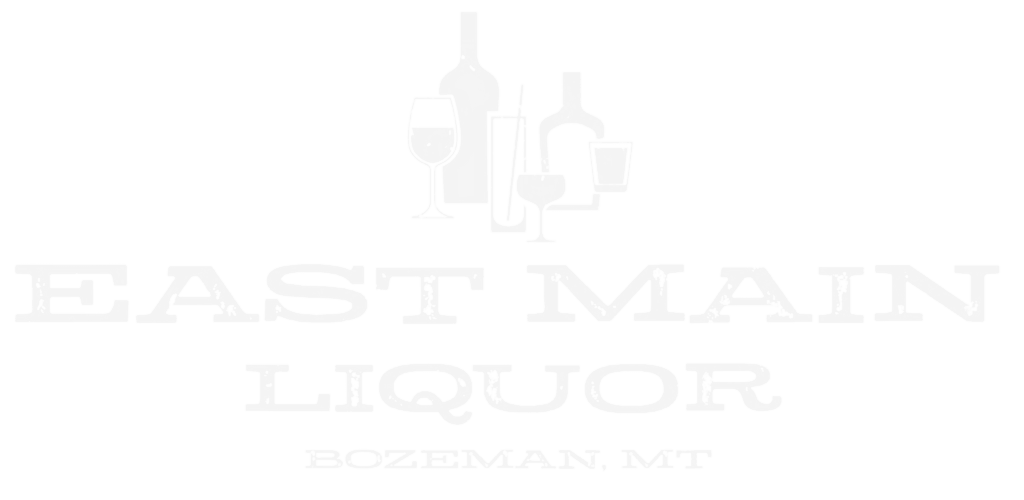 I can see this appears to be a logo for "Astmai Liquor" with a faint cityscape silhouette, but the image is quite washed out and low contrast. 

Alt text: Astmai Liqu